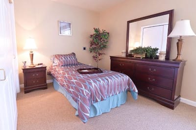 Cozy private room with bed and furnishings