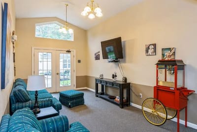 Bright interior common area with seating and decor