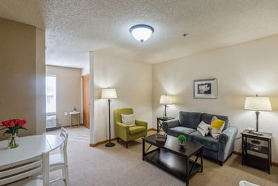 Cozy living space in a resident room with furniture
