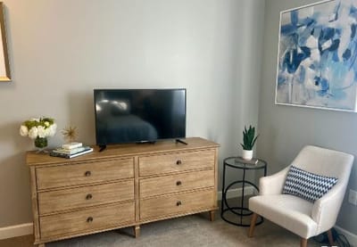 Cozy living space with modern decor and TV