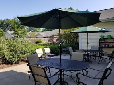 Outdoor seating area with umbrellas and tables