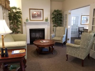 Cozy common area with seating and fireplace