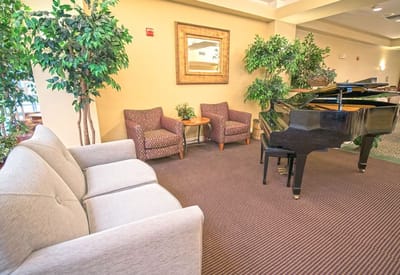 Common area with seating and a piano