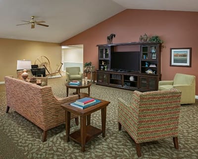 Common area with seating and entertainment center