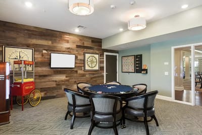Activity room with a poker table and decor