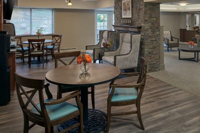 Bright common area with seating and flowers