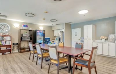 Common area with a table and seating