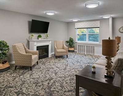 Comfortable common area with seating and fireplace