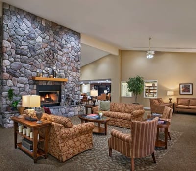 Cozy common area with seating by the fireplace