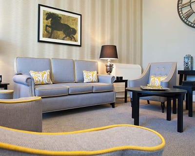 Cozy interior lounge area with seating and decor