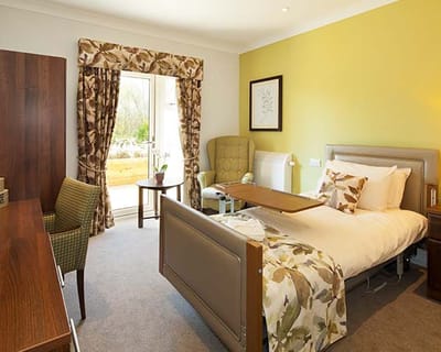 Cozy resident room with a view and comfortable furnishings