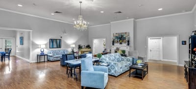 Bright common area with comfortable seating and decor