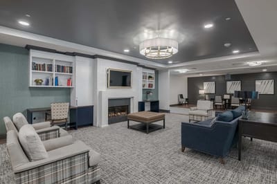 Interior common area with cozy seating and fireplace