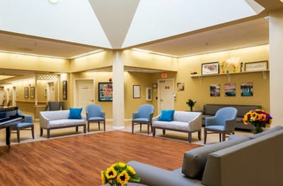 Bright common area with seating and decor