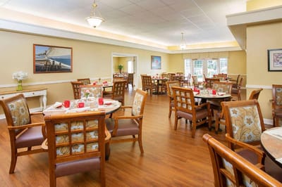 Bright and inviting dining area with tables and chairs