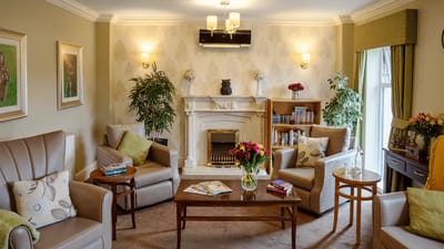 Cozy common area with seating and a fireplace