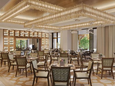 Elegant dining room with tables set for meals