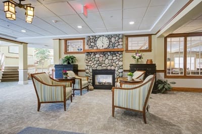 Cozy common area with seating and a fireplace