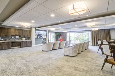 Bright common area with modern seating and decor