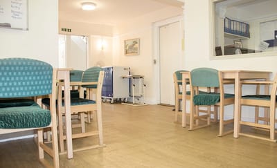 Interior common area with tables and chairs