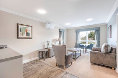 Bright, spacious living area in the facility