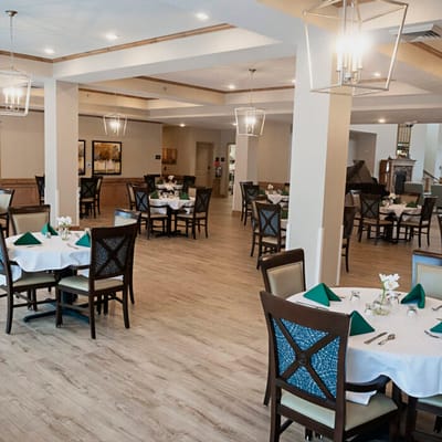 Elegant dining room setup with tables and decor