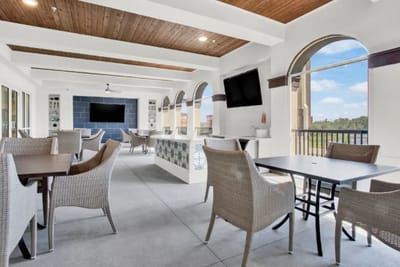 Bright common area with tables and chairs