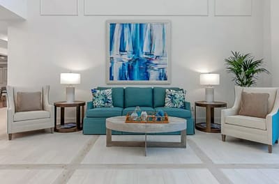 Bright interior common area with seating and art