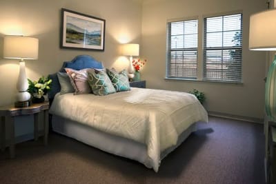 Cozy private room with decorative pillows and lamps