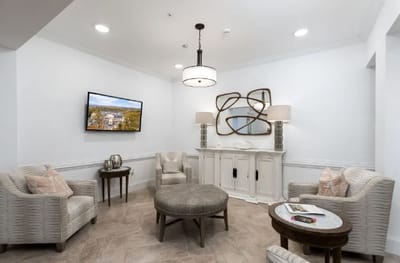 Cozy common area with seating and a television