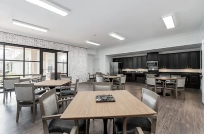 Bright dining room with wooden tables and chairs