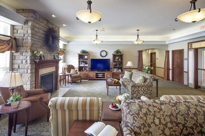 Cozy common area with seating and a fireplace