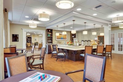 Interior of a common area with seating and a coffee station
