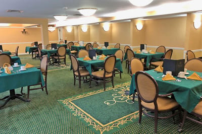 Dining area with tables set for meals