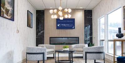 Facility logo displayed in a modern lobby
