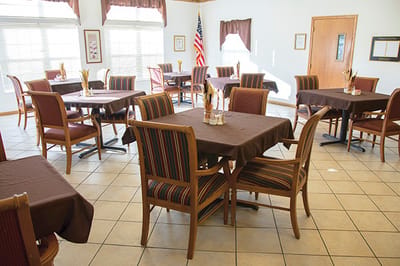 Dining room area with tables and chairs