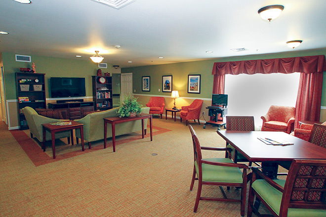 Common area with seating in a senior living facility