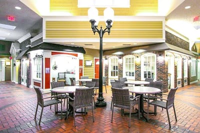 Interior common area with tables and chairs