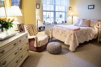 Cozy private resident room with floral decor