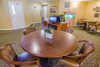 Interior common area with seating and computer station