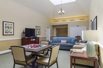 Bright common area with seating and decor