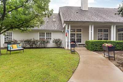 Outdoor space with seating and garden areas