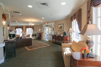 Common area with residents and comfortable seating