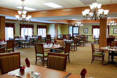 Dining room with tables set for meals