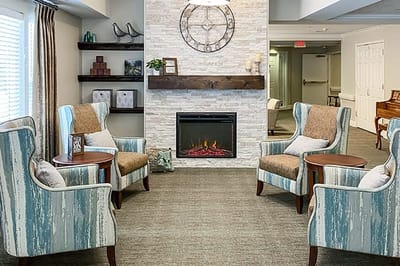 Cozy common area with comfortable seating and a fireplace
