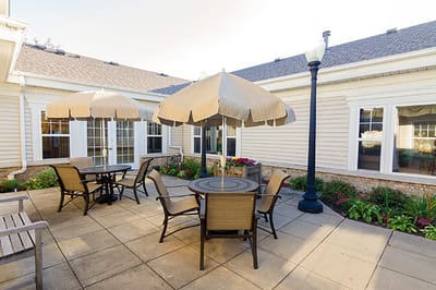 Outdoor patio with seating and umbrellas