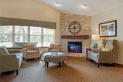 Cozy common area with fireplace and comfortable seating