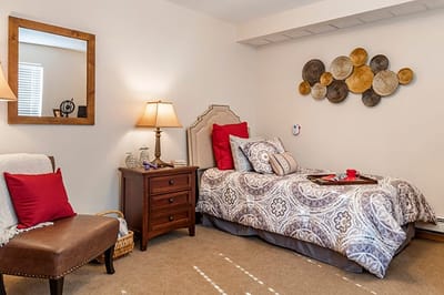 Cozy private room with decorative wall art and furnishings