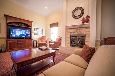 Cozy common area with seating and fireplace