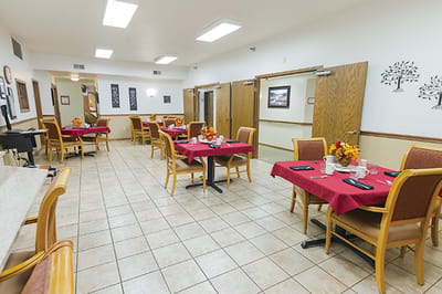 Dining area with tables set for meals